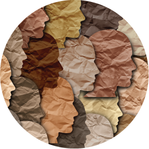 Picture of paper silhouette faces in different shades of brown.