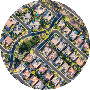 Aerial view looking directly down on homes in a planned exclusive residential community.